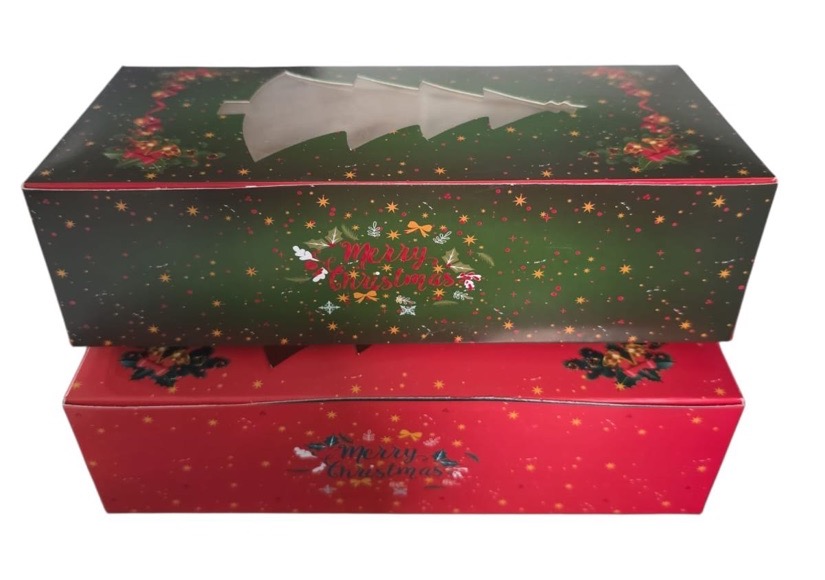 Two printed Christmas plum cake boxes, one green and one red